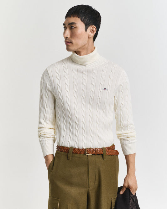 Baumwollrollkragenpullover mit Zopfmuster